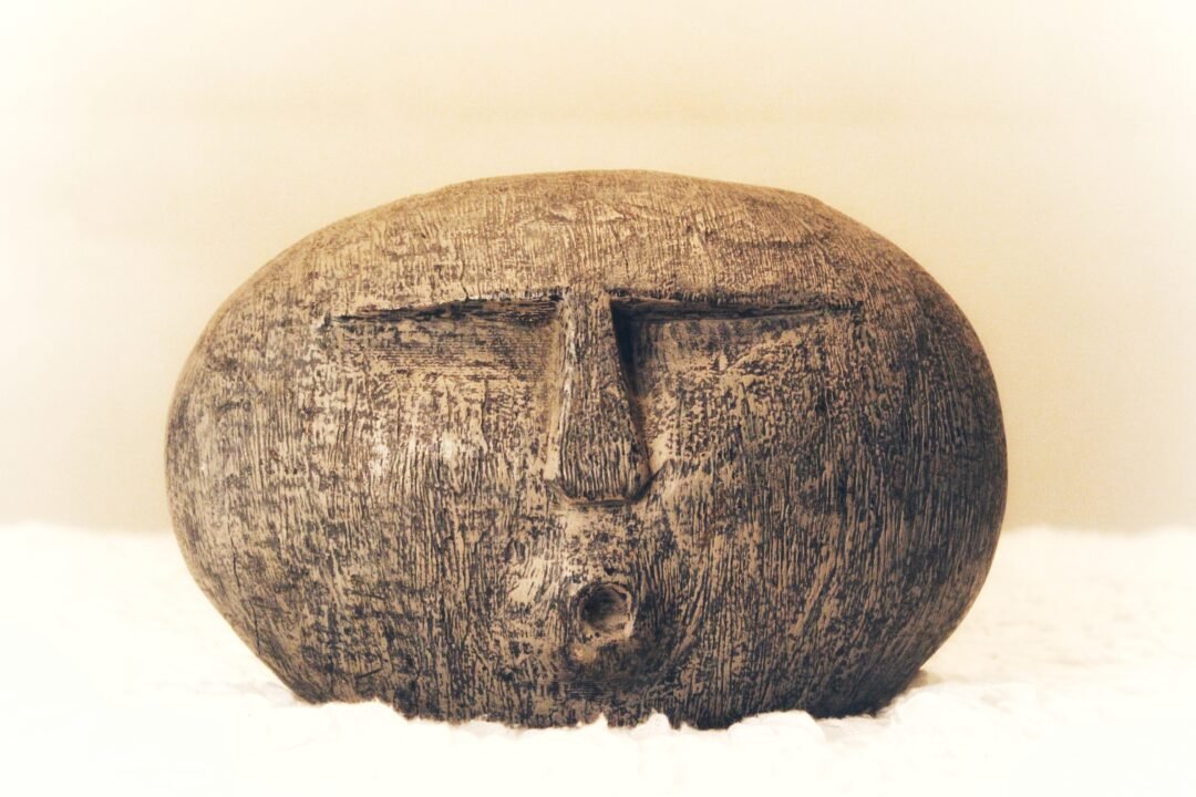 1000929825 Rounded Face Sculpture